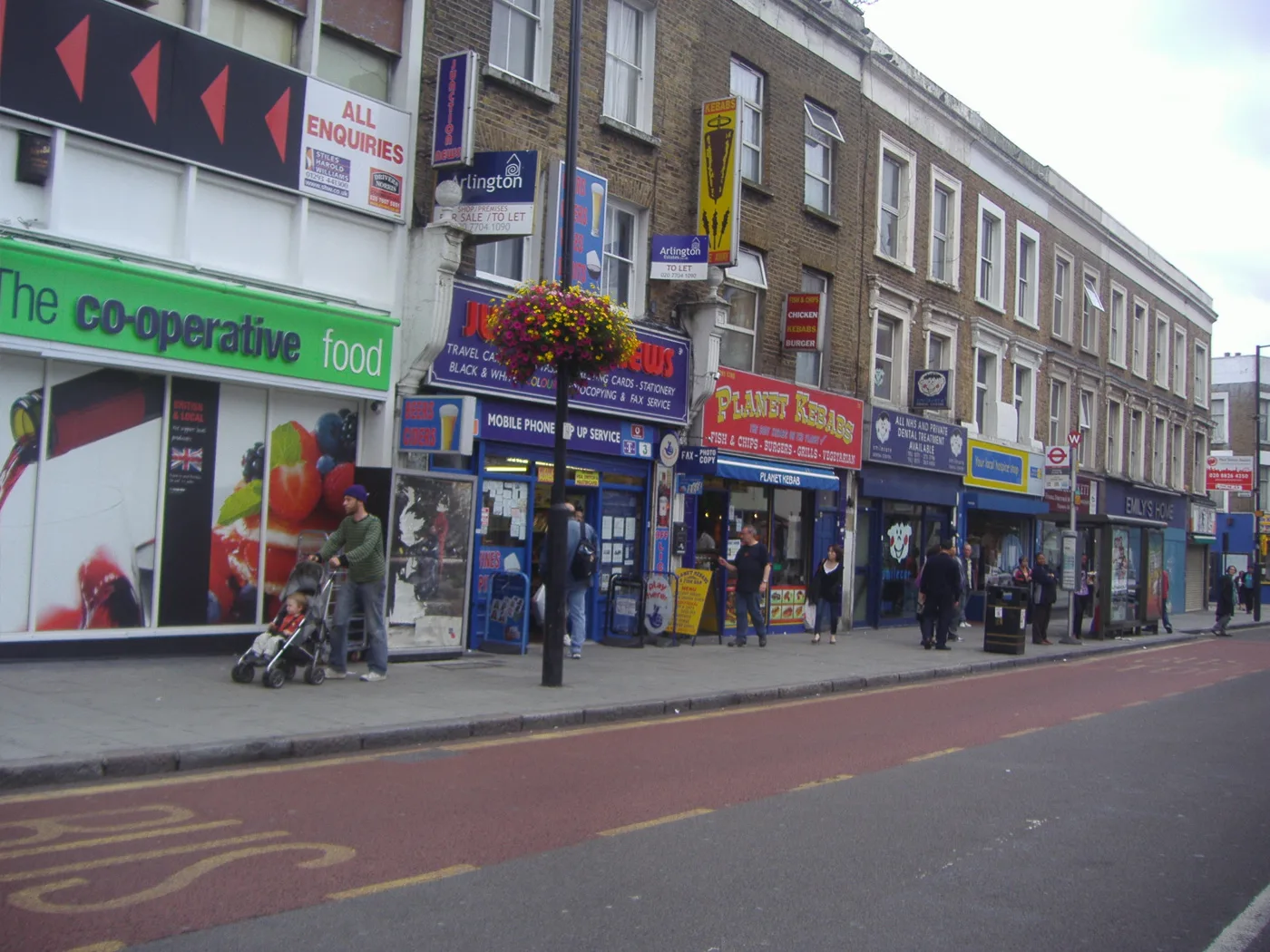 Shops on Junction Road, Archway, where one of September's businesses rated 1 trades. The Co-op and Planet Kebab in the picture are not in this report.