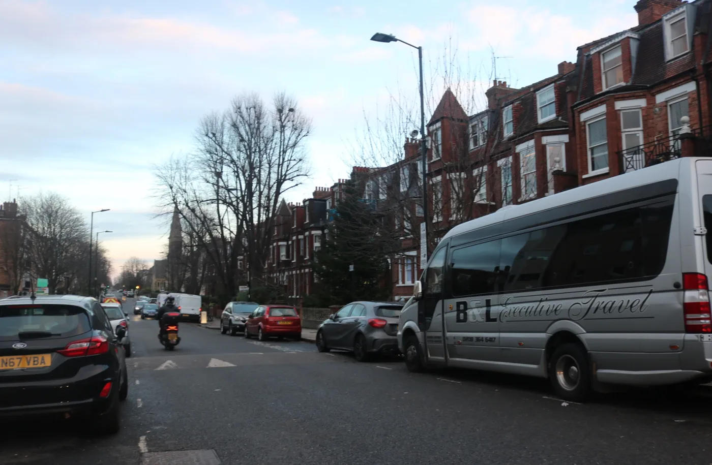 Tollington Park, Finsbury Park. The parcels are handed out at the road's junction with Stroud Green Road